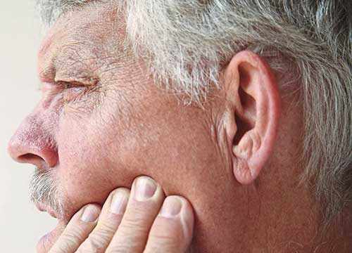 Personne ayant une rage de dents