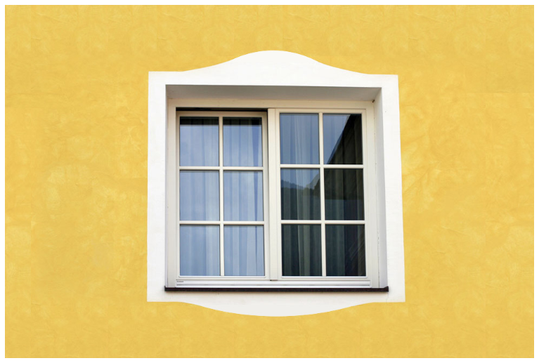 Une belle fenêtre en double vitrage sur un mur jaune