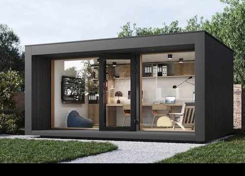 Studio de jardin en bois MyGreenkub installé dans un jardin